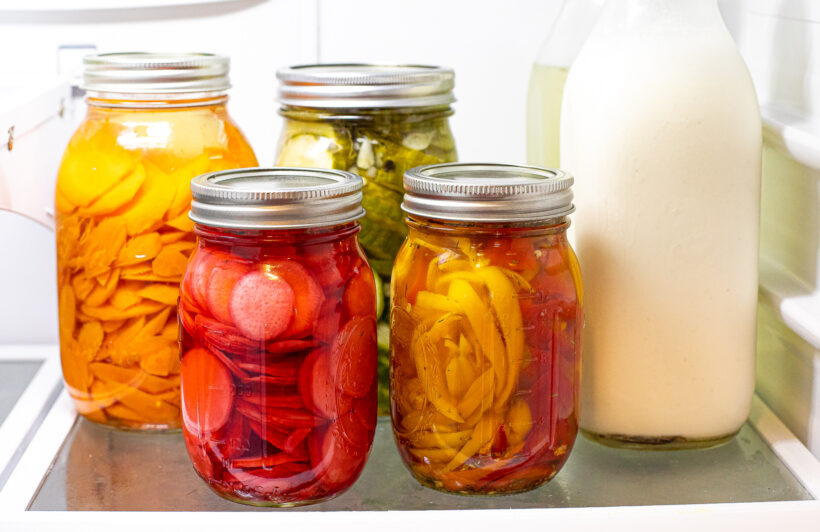Pickled veggies in mason jars in the fridge.