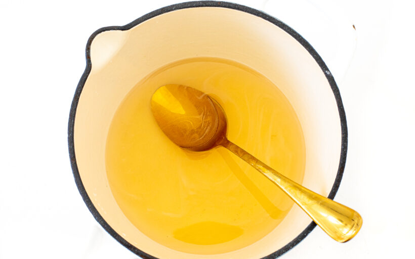 Water, vinegar, salt and honey in a saucepan.