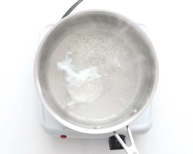 poaching eggs in saucepan