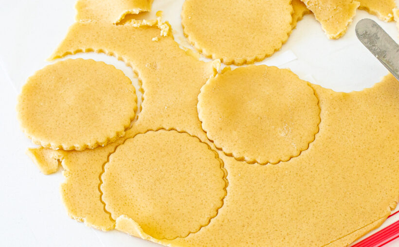 Tart dough rolled out and cut.