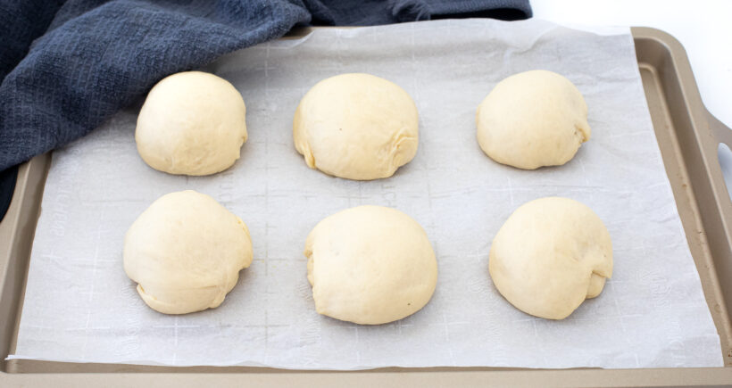 rolls on baking sheet after resting