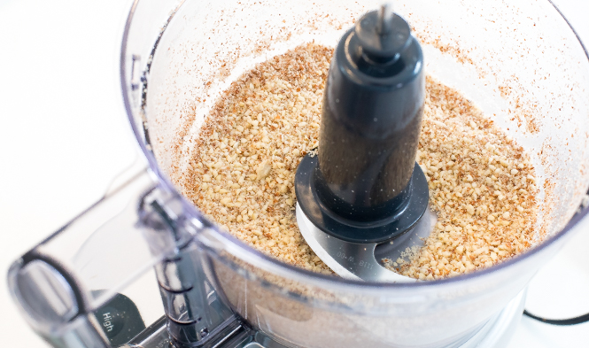 Pulsing almonds in a food processor
