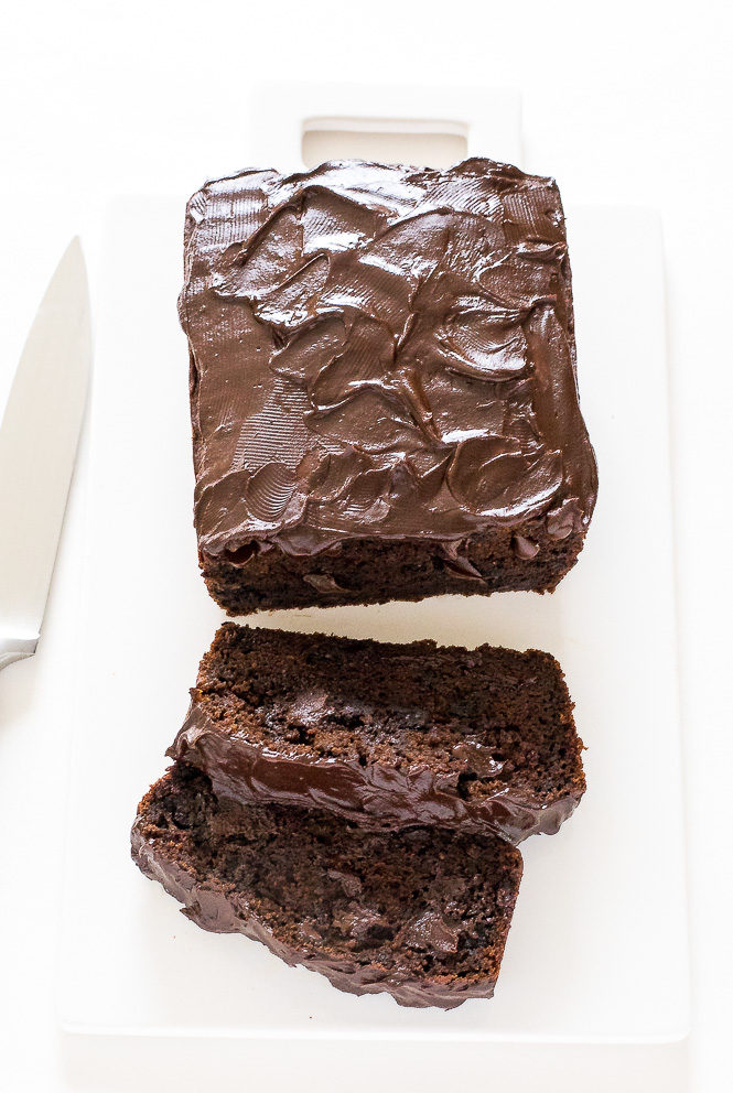Chocolate Chip Pumpkin Bread | chefsavvy.com Top view of chocolate bread on a cutting board with two slices sliced from the bread.