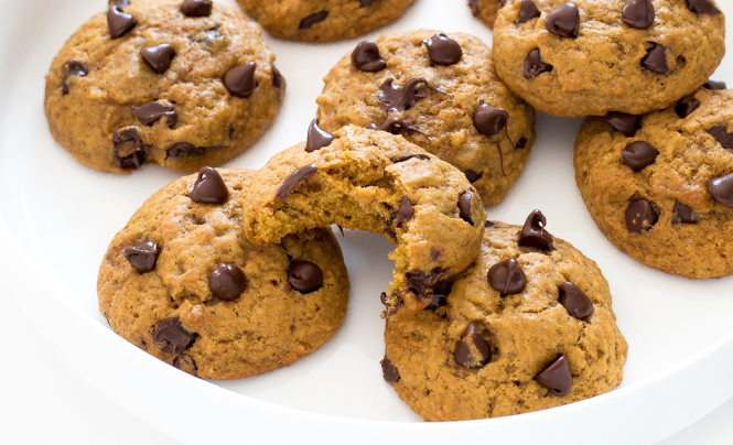 pumpkin cookies with chocolate chips on top