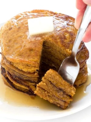 pumpkin pancakes on plate with fork