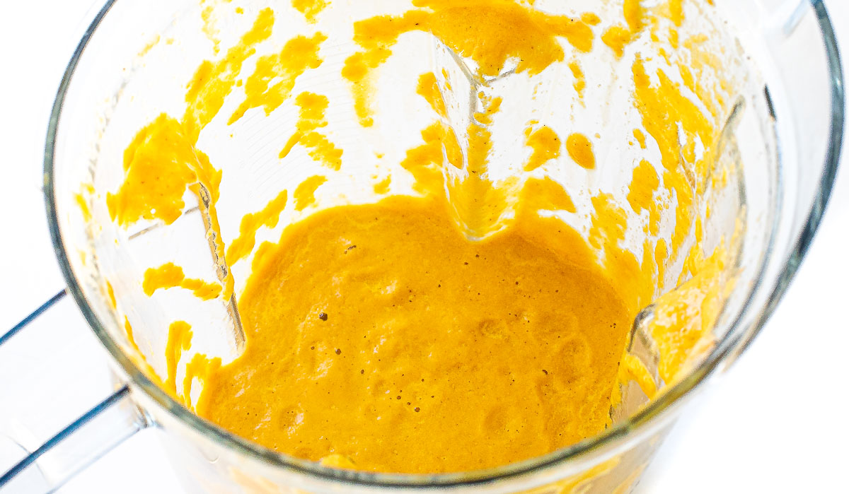 pureed vegetables and broth in blender