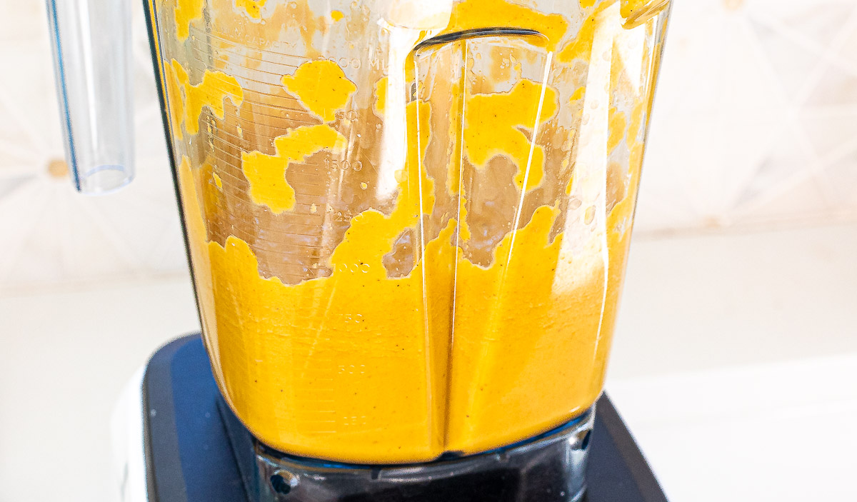 pureeing sautéed vegetables in blender