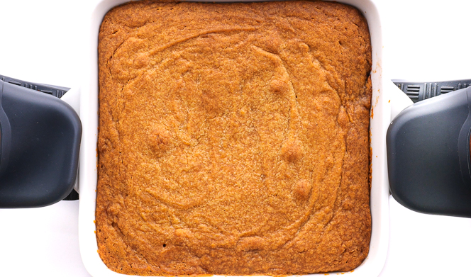 removing apple cake from oven