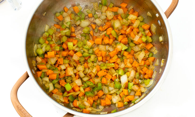 Chopped veggies in pot.
