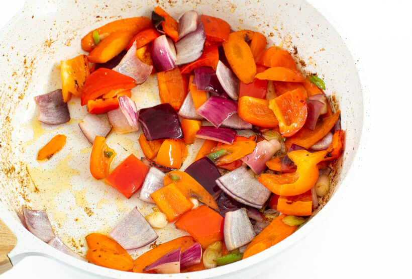 Vegetables cooked in a large skillet.