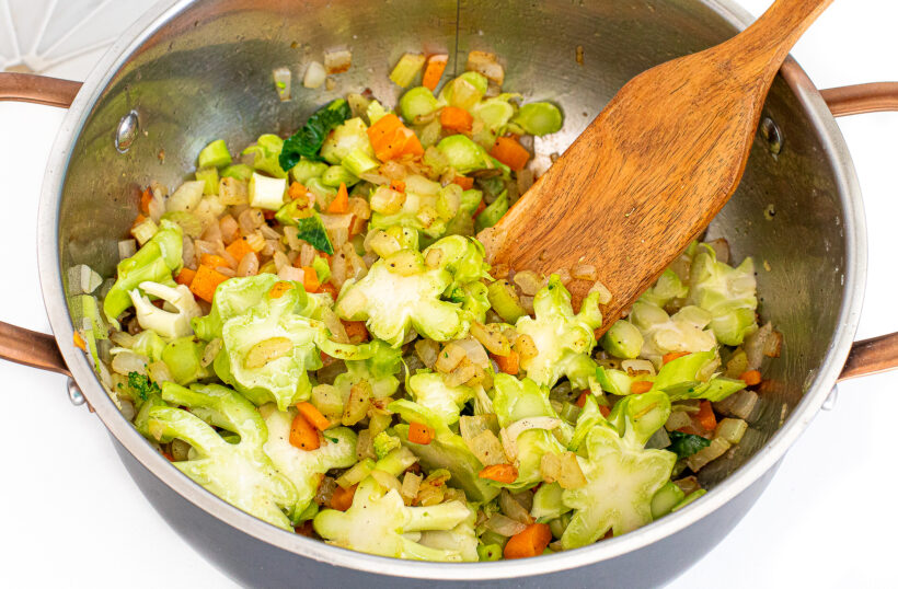 sautéing broccoli stems in large pan until tender