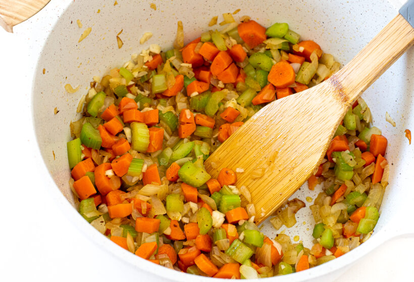 sauteeing carrots, onions and celery in large pot