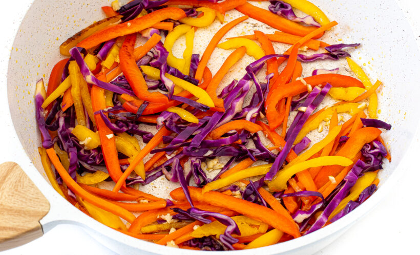 sautéing bell peppers, carrots and cabbage