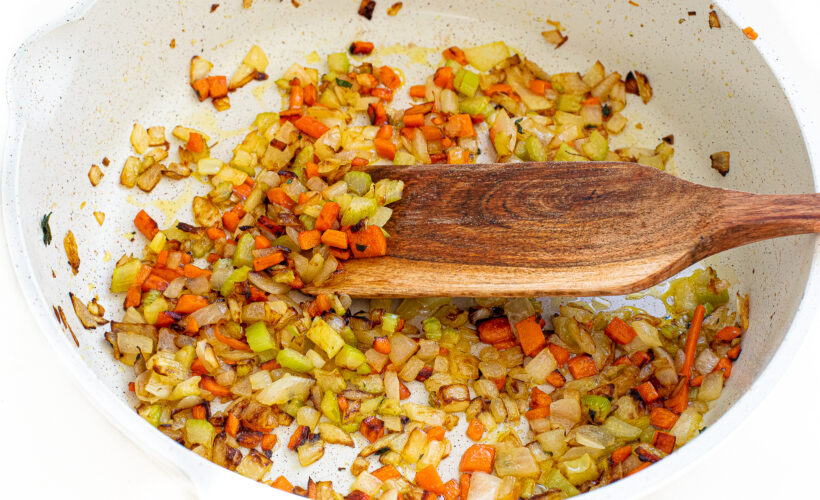Sauteed veggies in a skillet.