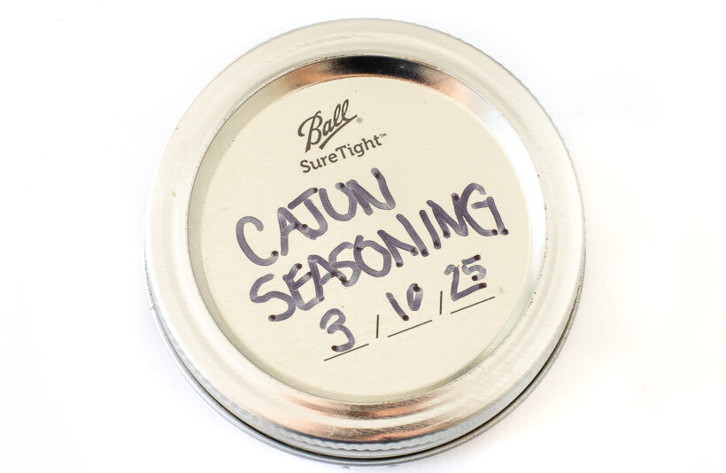 overhead shot of cajun seasoning in jar