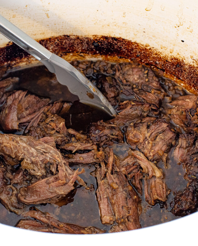 shredded chuck roast in the slow cooker