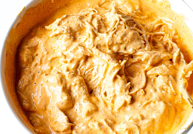 Shredded chicken added to dip base.