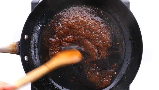 simmering teriyaki sauce in large skillet