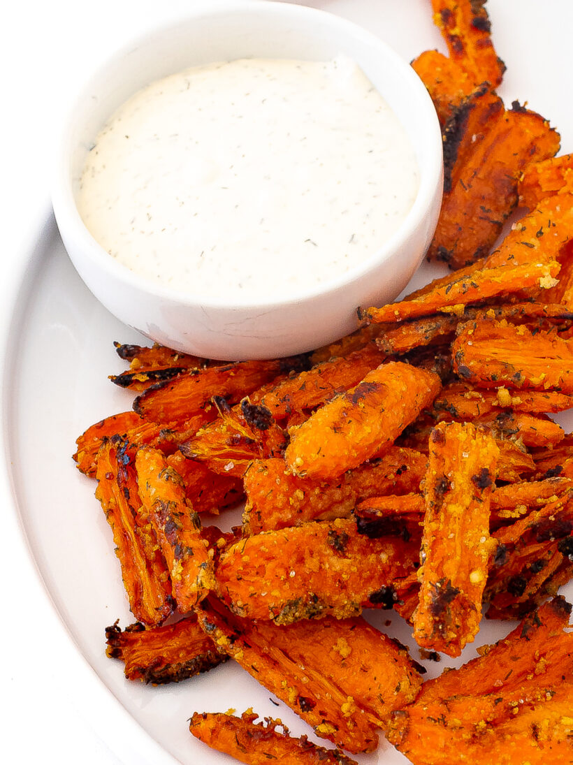 Smashed and roasted carrots served with ranch.