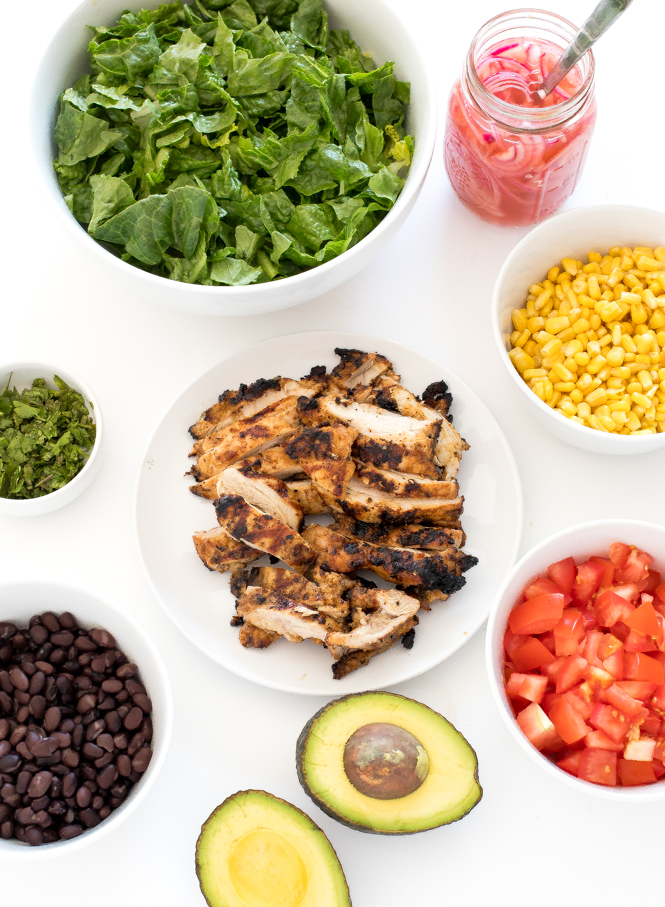southwest chicken salad ingredients on white counter