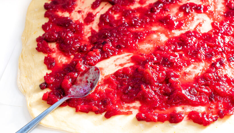 Cranberry sauce on top of the brioche dough.