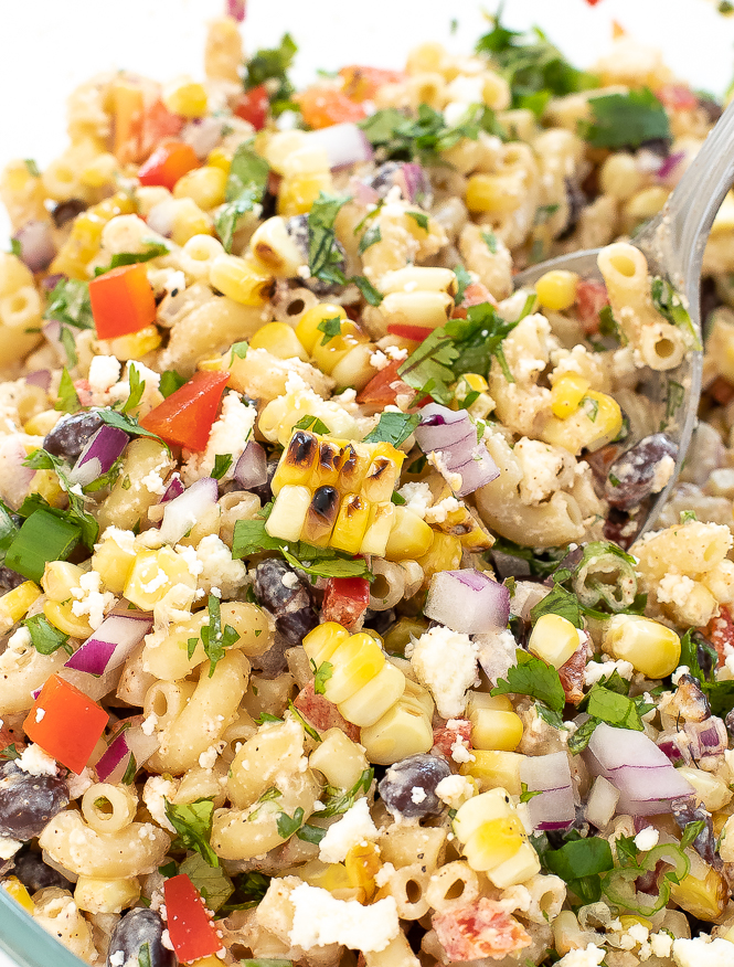 Mexican Street Corn Pasta Salad with a spoon.