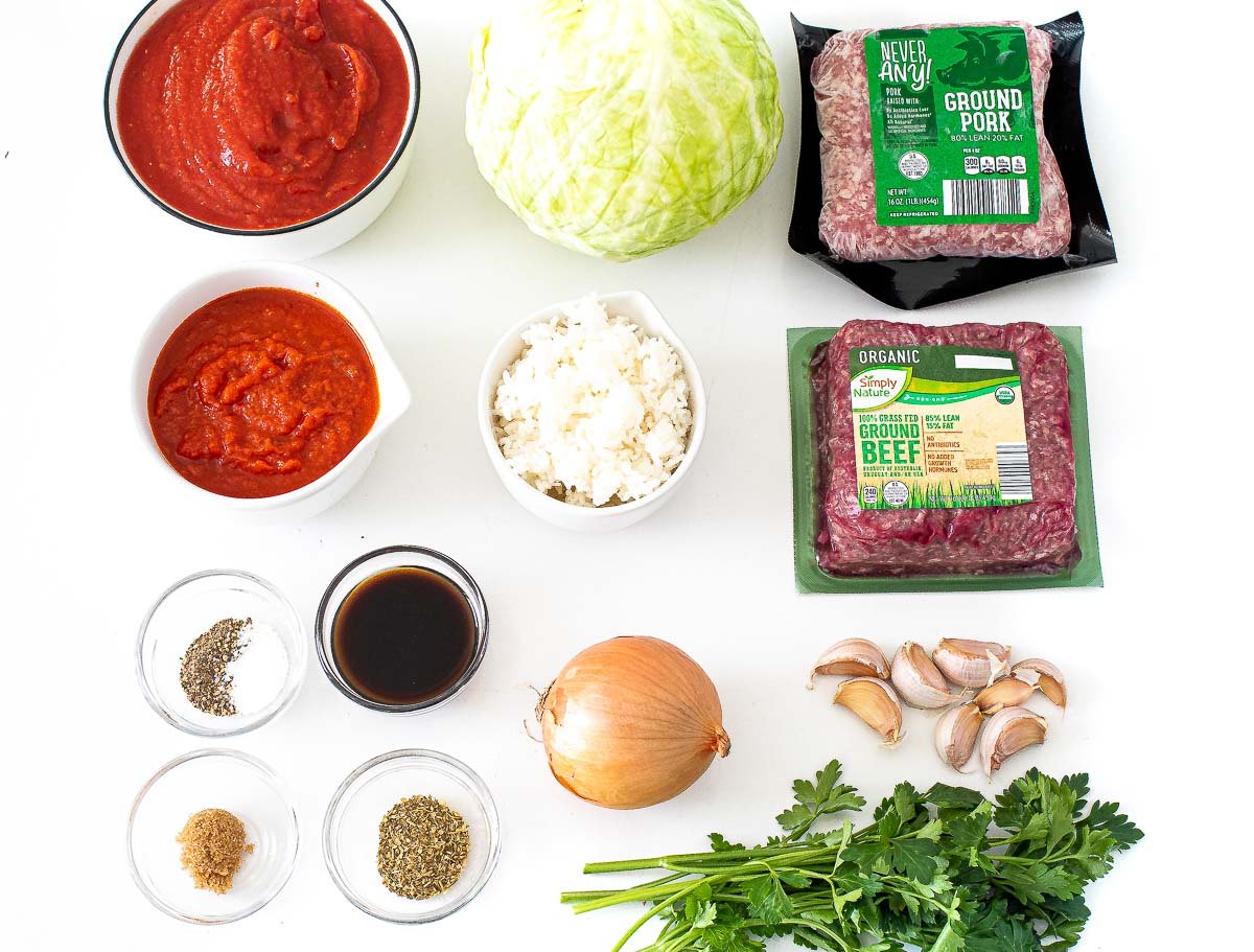 ingredients for stuffed cabbage rolls on white counter top
