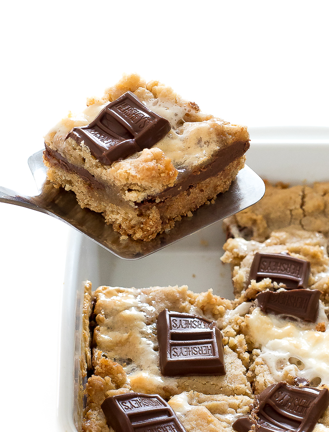 Best S'mores Bars | chefsavvy.com removing square of smore's bars from casserole dish