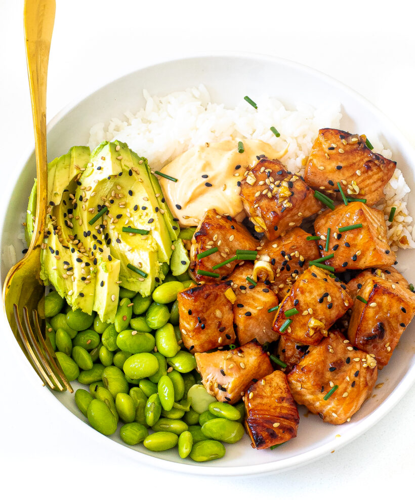 Teriyaki salmon bowl with rice, edamame and avocado. 