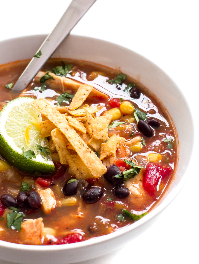 Slow Cooker Chicken Enchilada Soup in white bowl Slow Cooker Chicken Enchilada Soup in white bowl