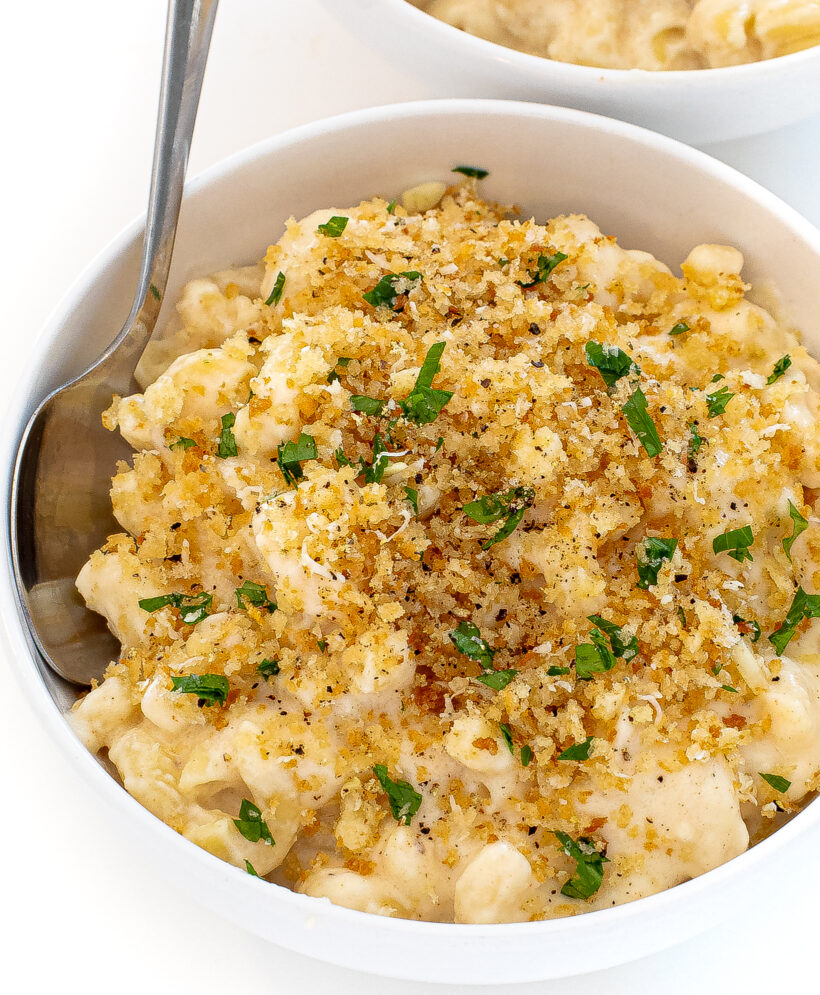 Mac and cheese topped with garlic parmesan breadcrumbs.