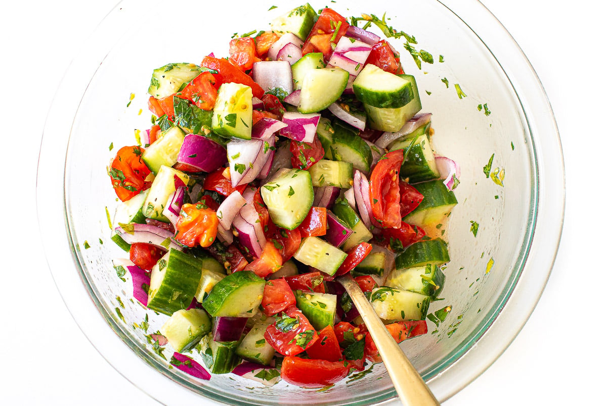 Cucumber tomato salad in a bowl.