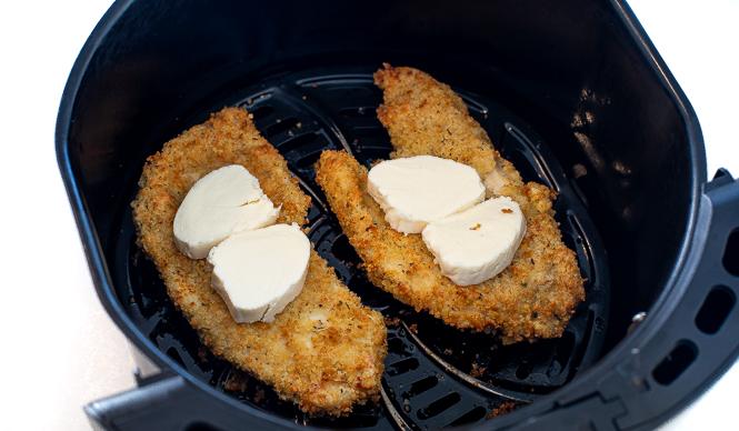 Breaded chicken with fresh mozzarella in the air fryer. 