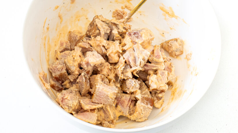 Ahi tuna mixed with spicy mayo in a bowl.