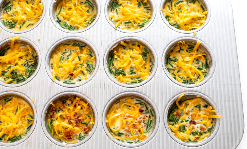 Egg mixture in the muffin tin before being baked. 