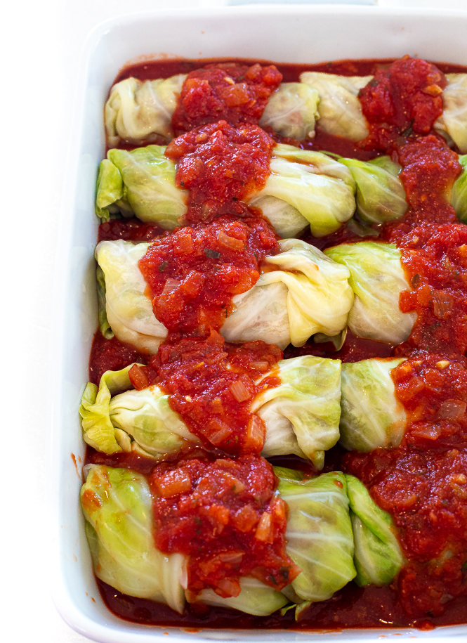 unbaked cabbage rolls in casserole dish