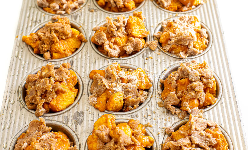 Muffin cups in a muffin tin.