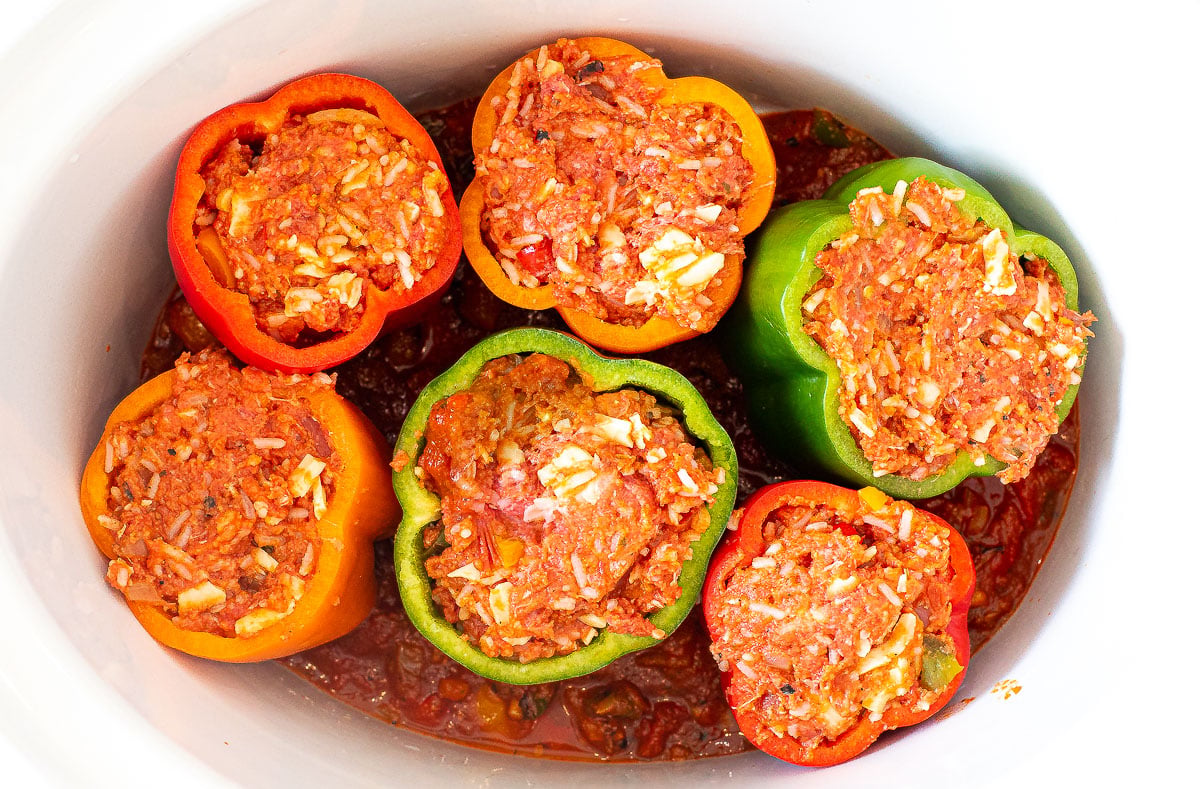 uncooked stuffed pepper in crockpot