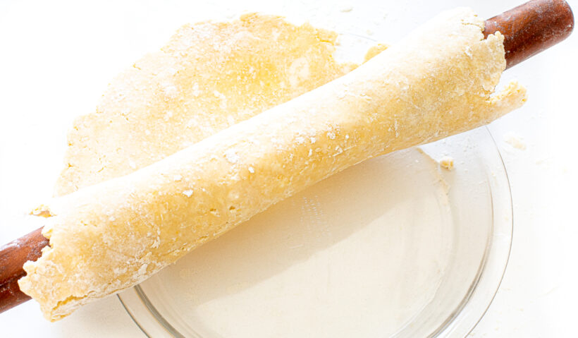 Pie crust wrapped around rolling pin.