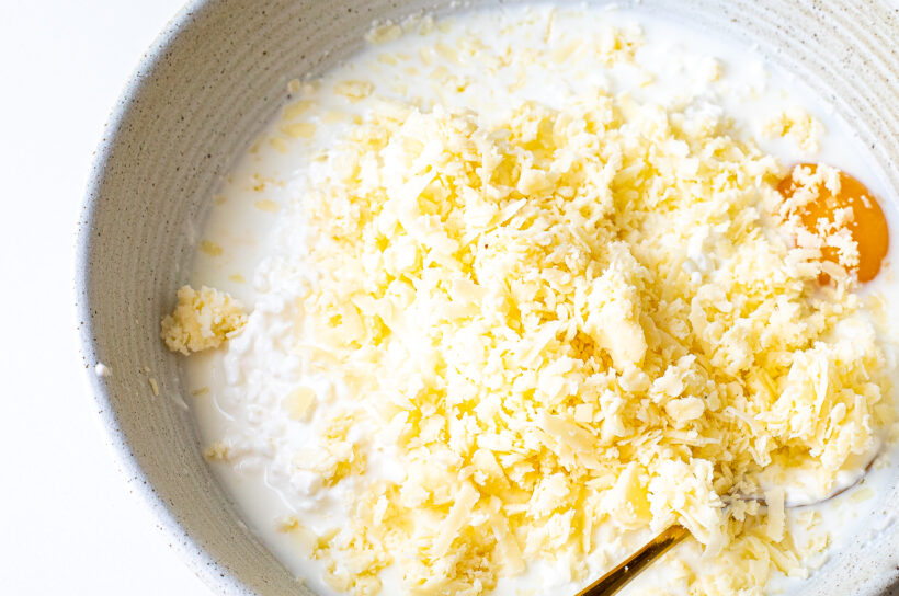 Wet ingredients in a white mixing bowl.