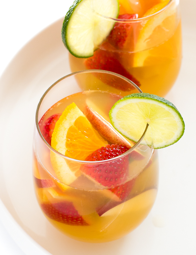 wine with fruit in glasses